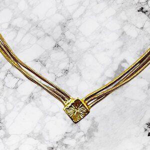Napier Gold-Tone Triple-Strand Necklace With Diamond Shape Pendant